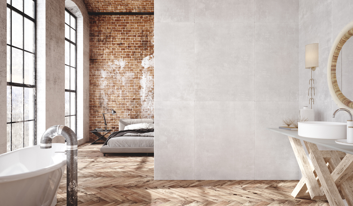 This industrial style bathroom combines all the materials distinct to the style: wood, metal, concrete, and brick.