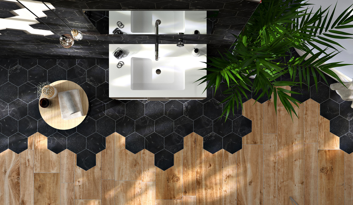 Wood look tile transition to hexagonal tile on floor of bathroom