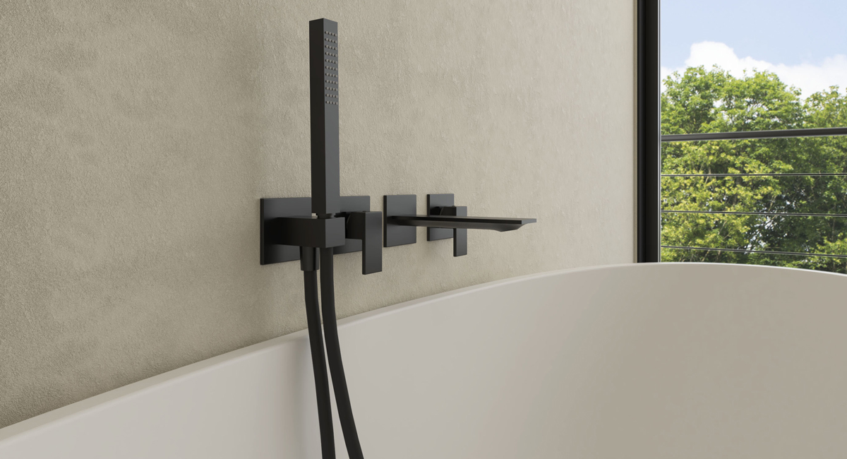 DomuS3D September Project of the month: an elegant and modern bathroom featuring Treemme's Q30 collection. Close up of bathtub faucet. 